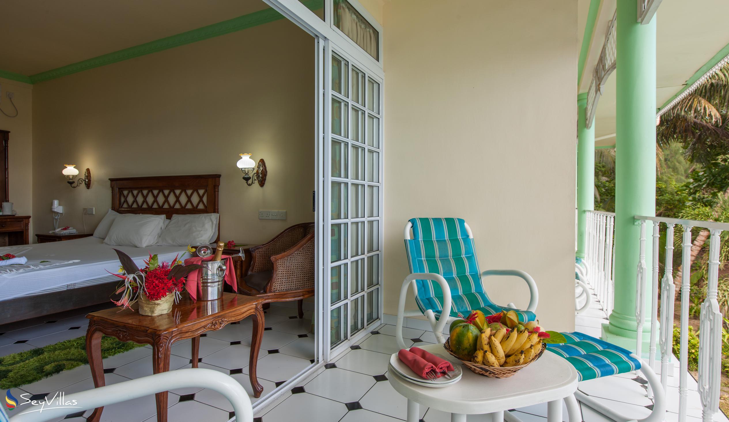 Foto 35: Palm Beach Hotel - Chambre Familiale - Praslin (Seychelles)