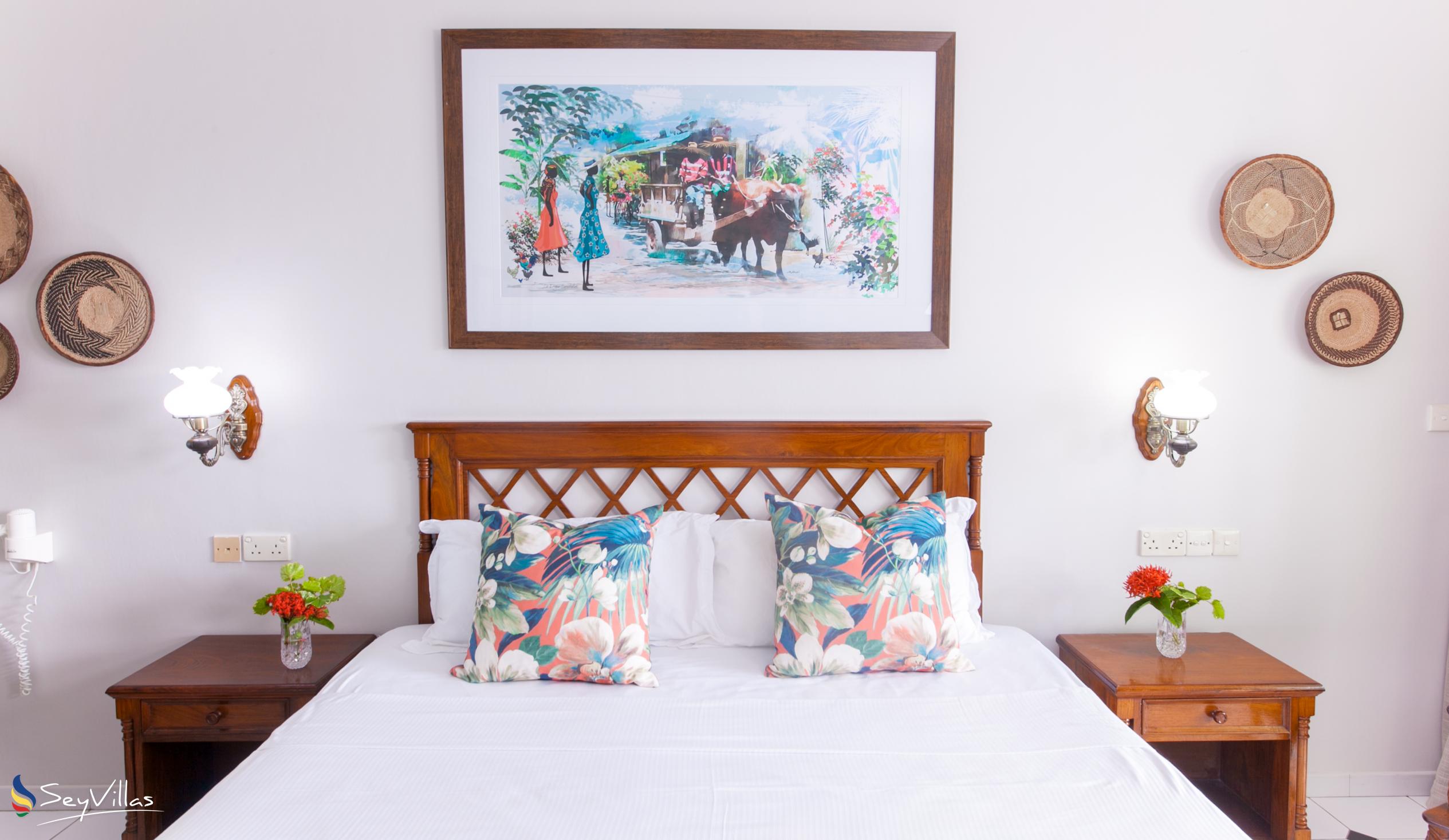 Foto 59: Palm Beach Hotel - Standard Zimmer - Praslin (Seychellen)