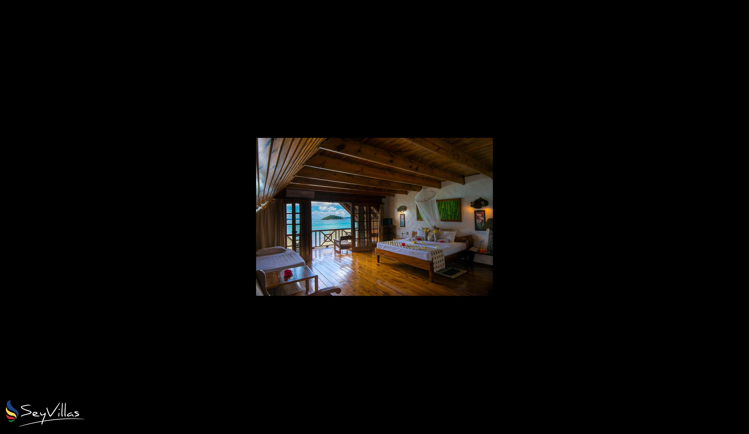 Foto 99: Colibri Guesthouse - Superior-Holzzimmer mit Meerblick - Praslin (Seychellen)