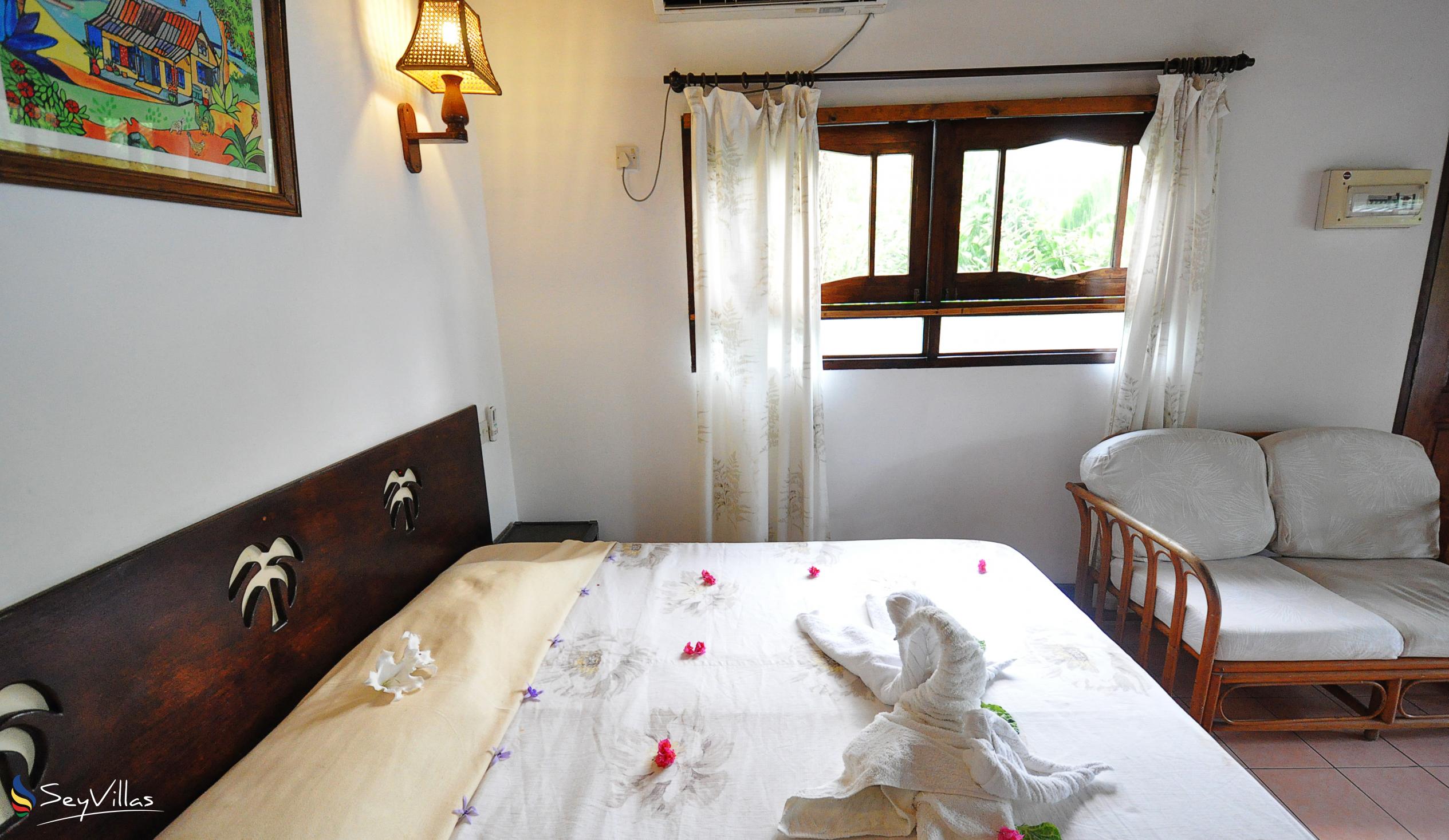 Foto 46: Romance Bungalows - Standardzimmer - Mahé (Seychellen)