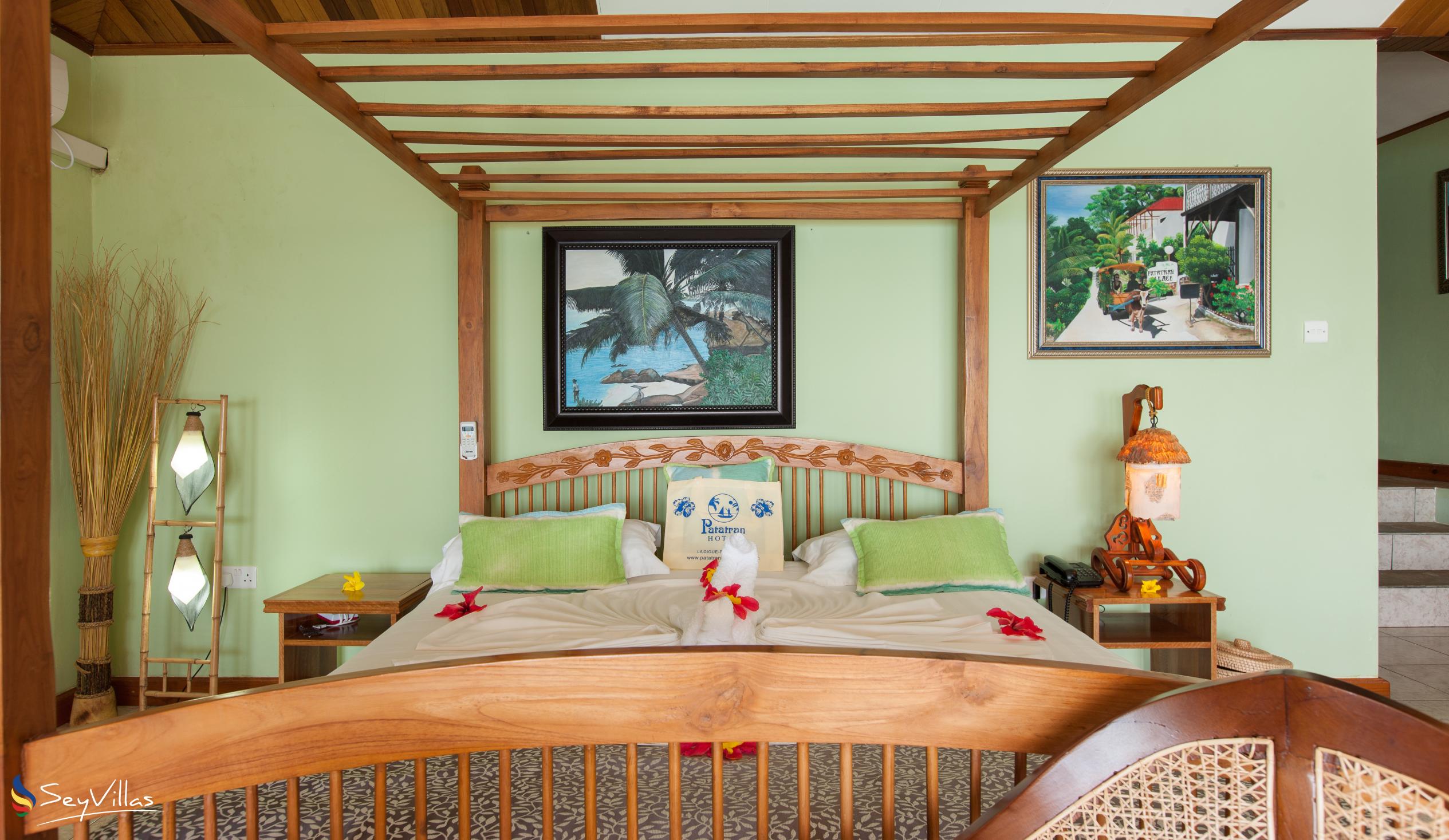 Foto 30: Patatran Village Hotel - Deluxe Zimmer - La Digue (Seychellen)