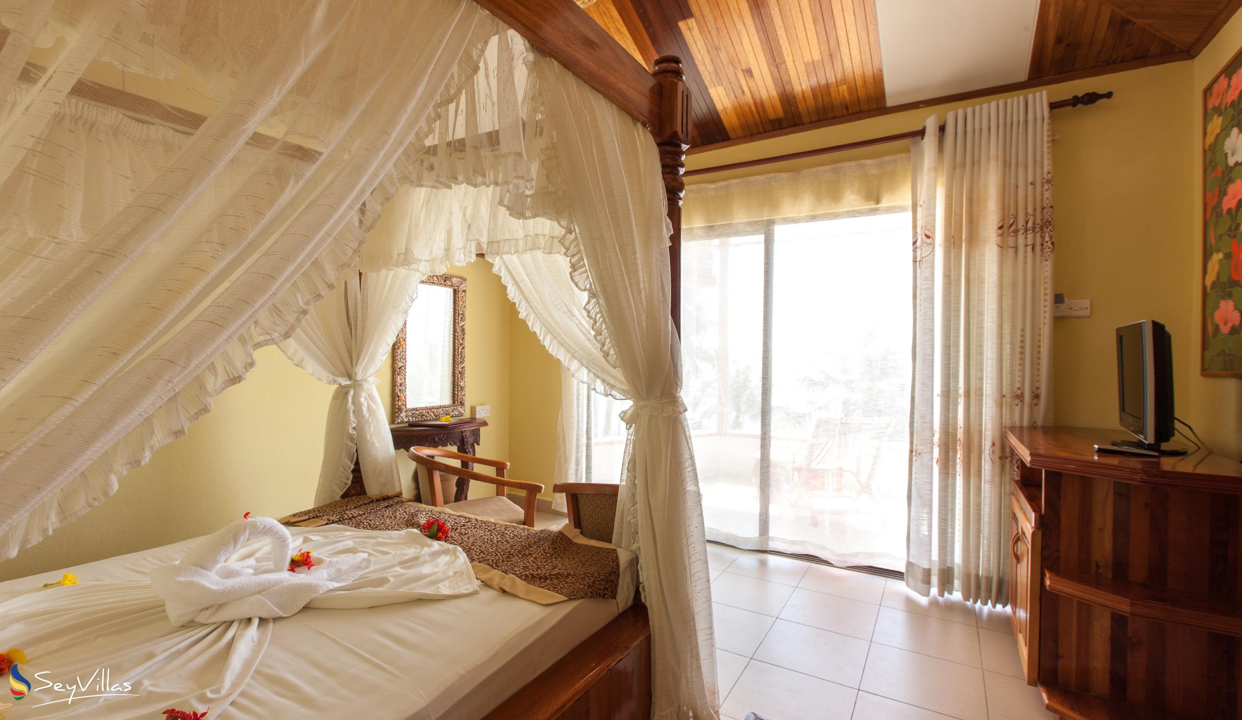 Foto 24: Patatran Village Hotel - Standard Zimmer - La Digue (Seychellen)