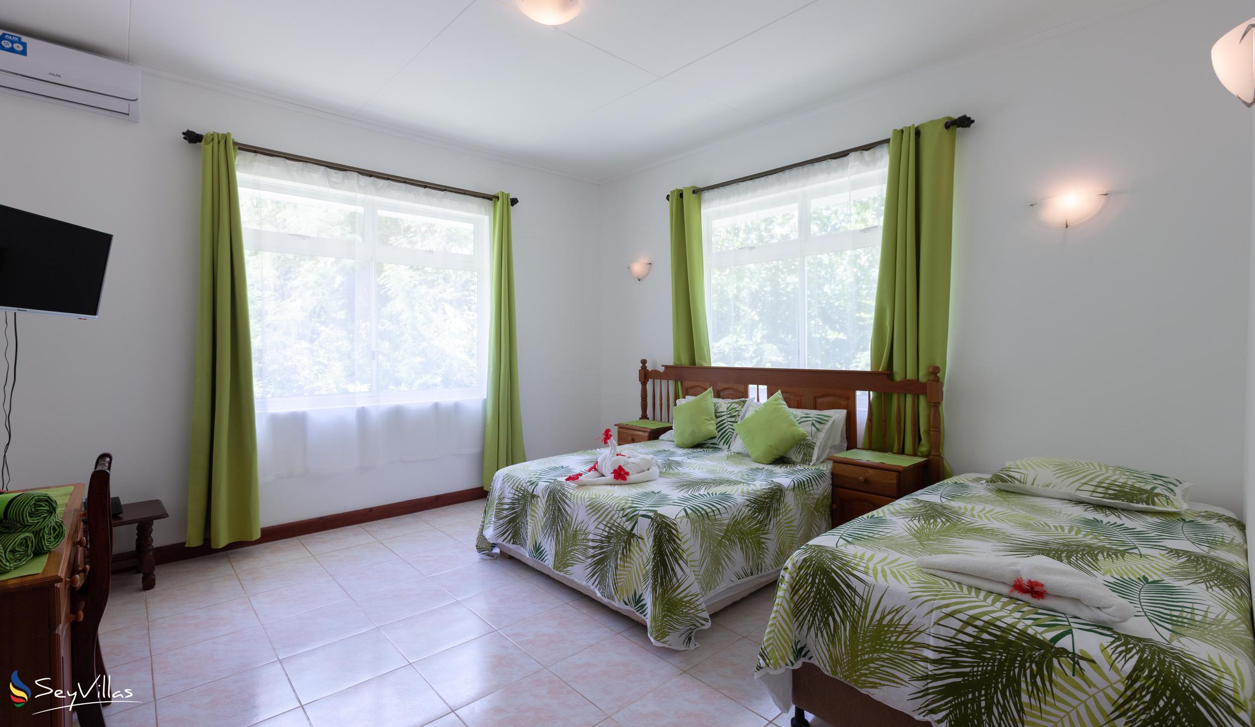 Foto 58: Le Chevalier Bay Guesthouse - Chambre Triple Standard - Praslin (Seychelles)