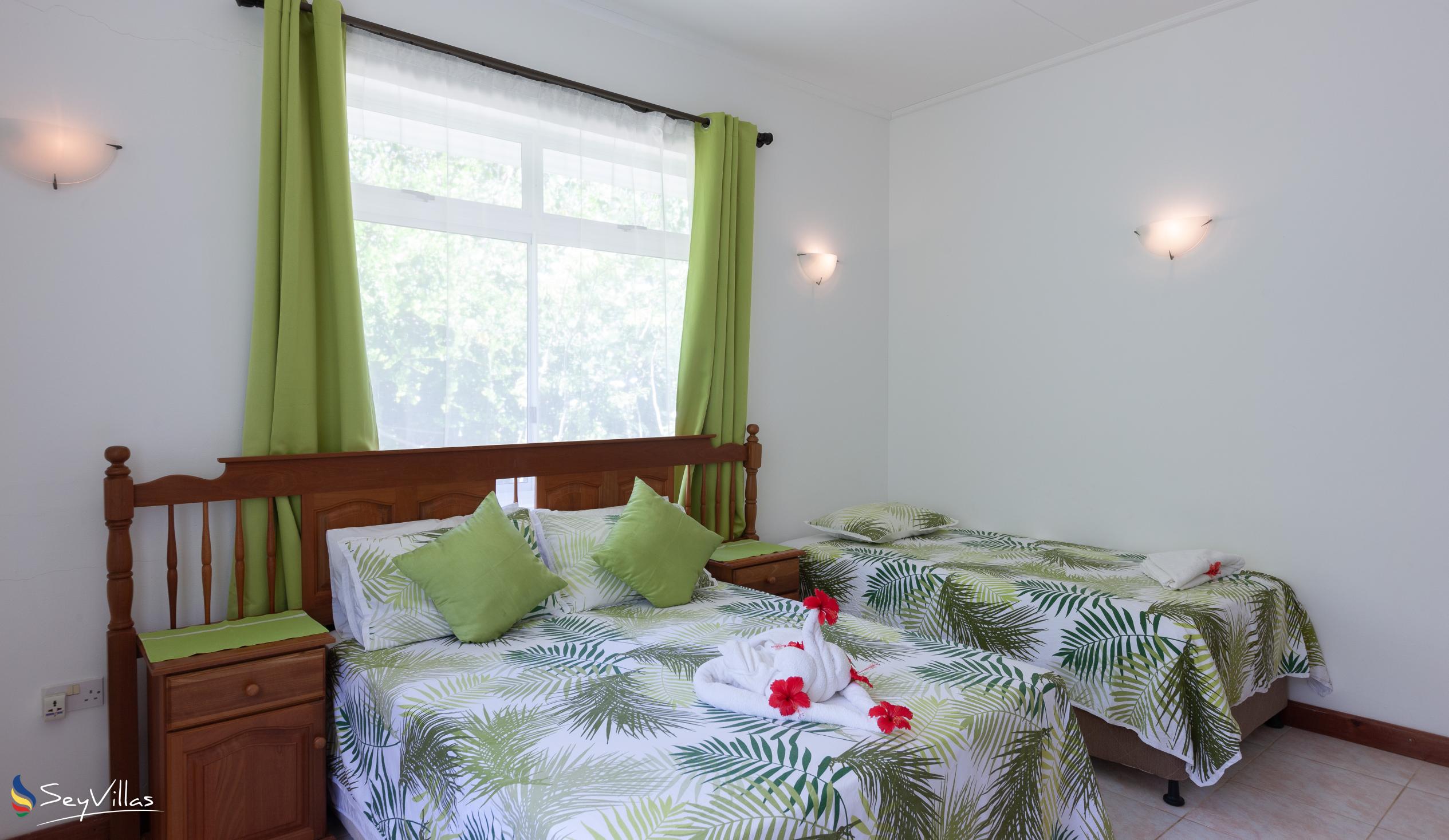 Photo 53: Le Chevalier Bay Guesthouse - Standard Triple Room - Praslin (Seychelles)