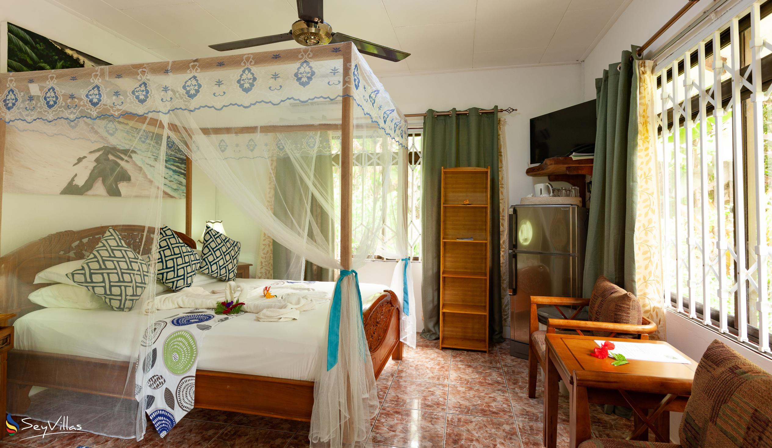 Foto 29: Buisson Guest House - Chambre Eliconia - La Digue (Seychelles)