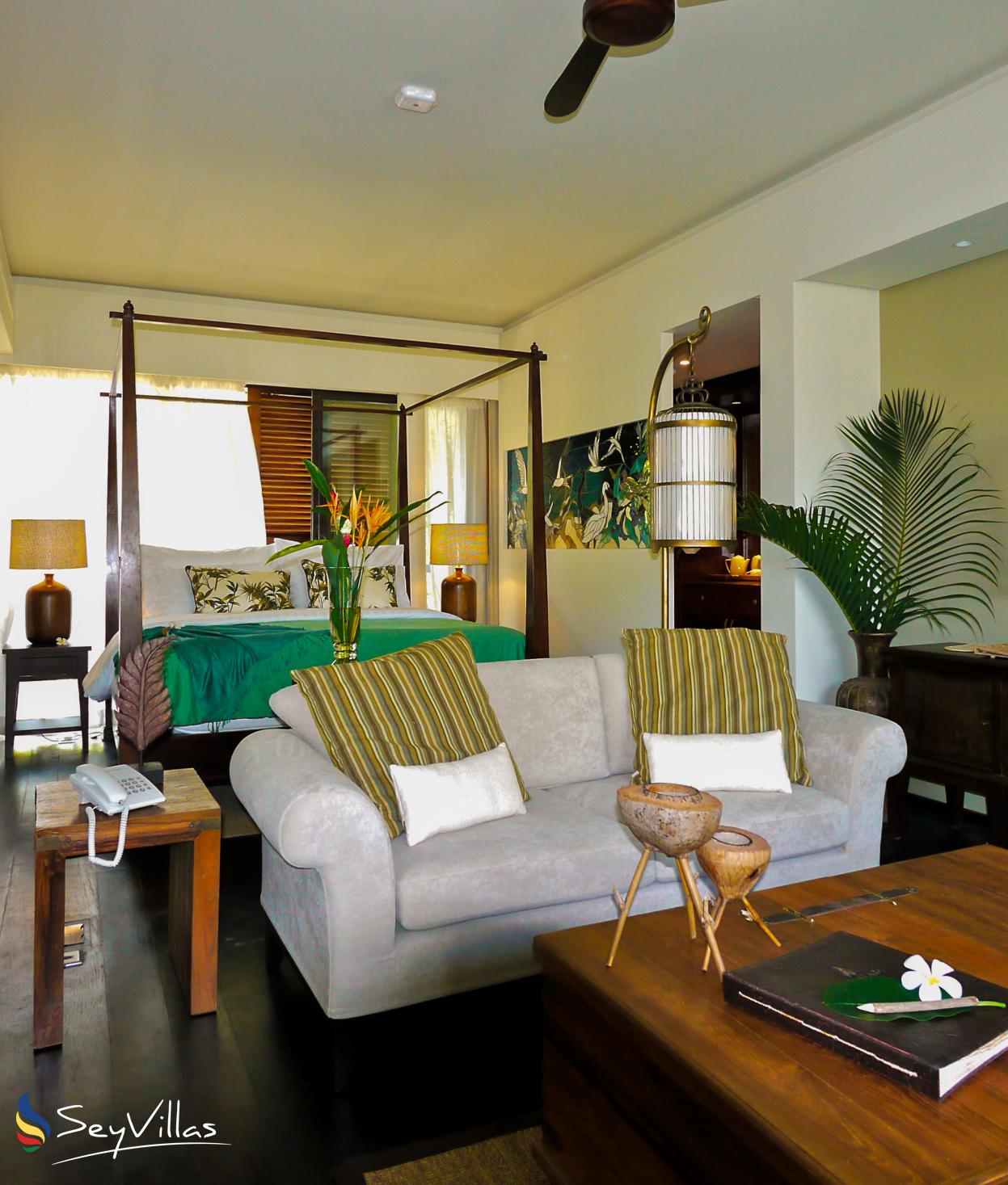 Foto 74: Dhevatara Beach Hotel - Suite mit Poolblick - Praslin (Seychellen)