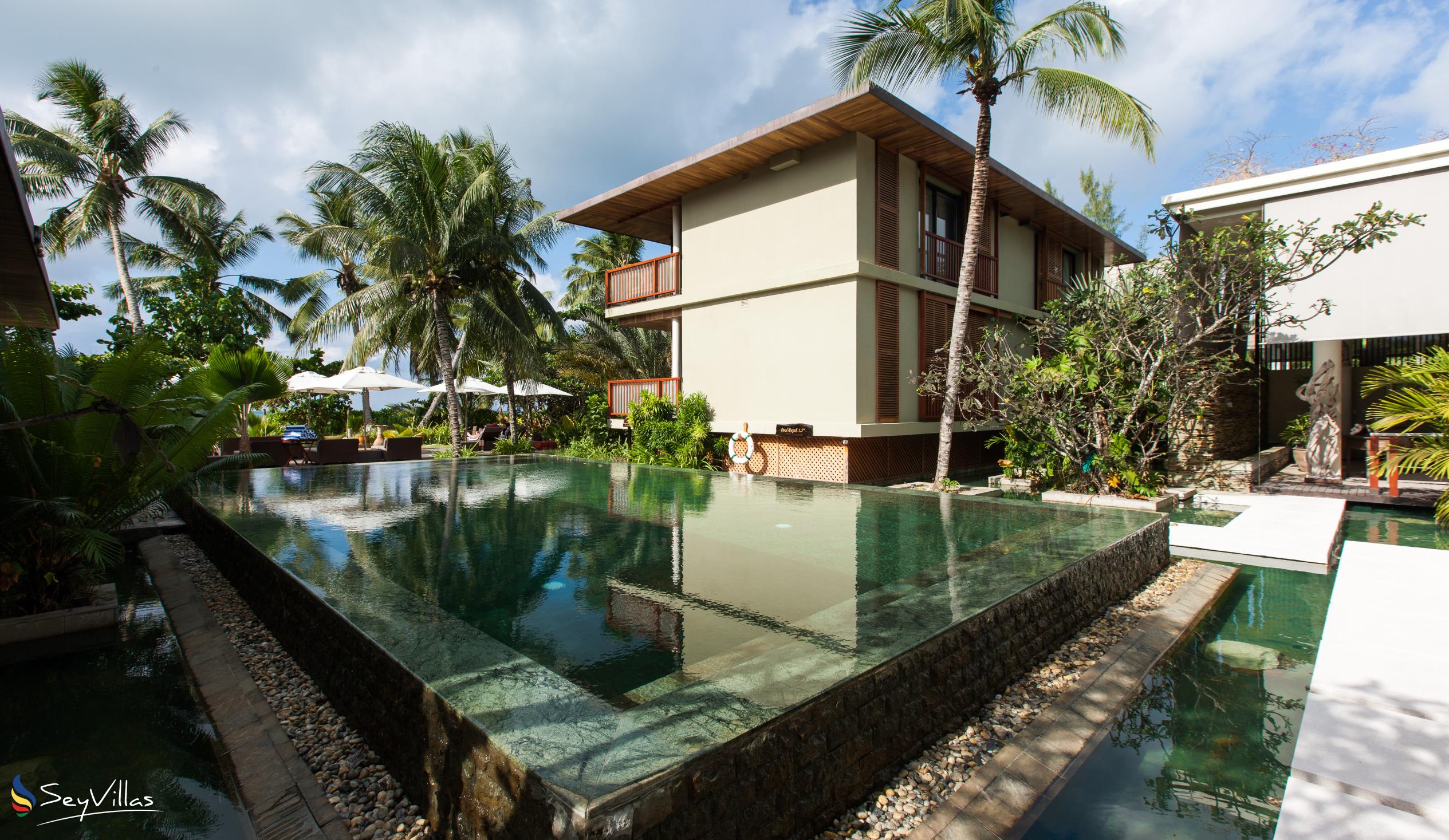 Foto 7: Dhevatara Beach Hotel - Extérieur - Praslin (Seychelles)