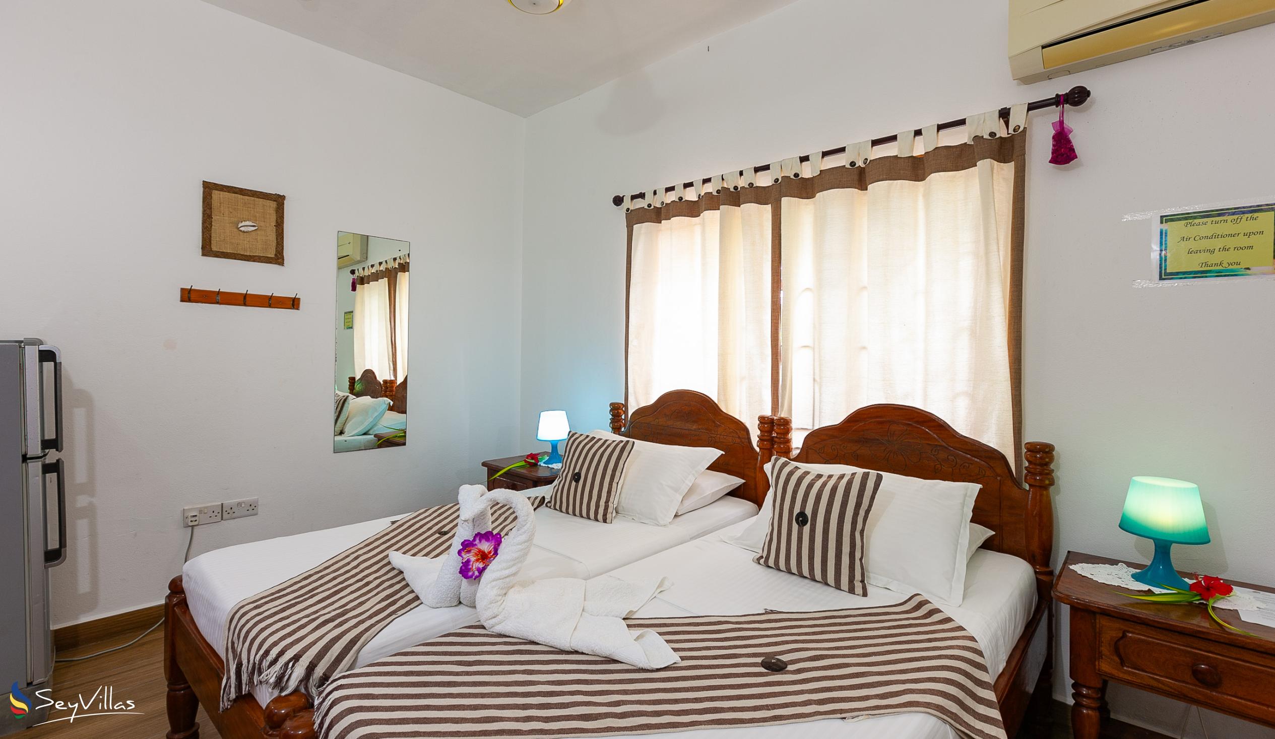 Foto 81: Tannette's Villa - Chambre avec lits jumeaux - La Digue (Seychelles)