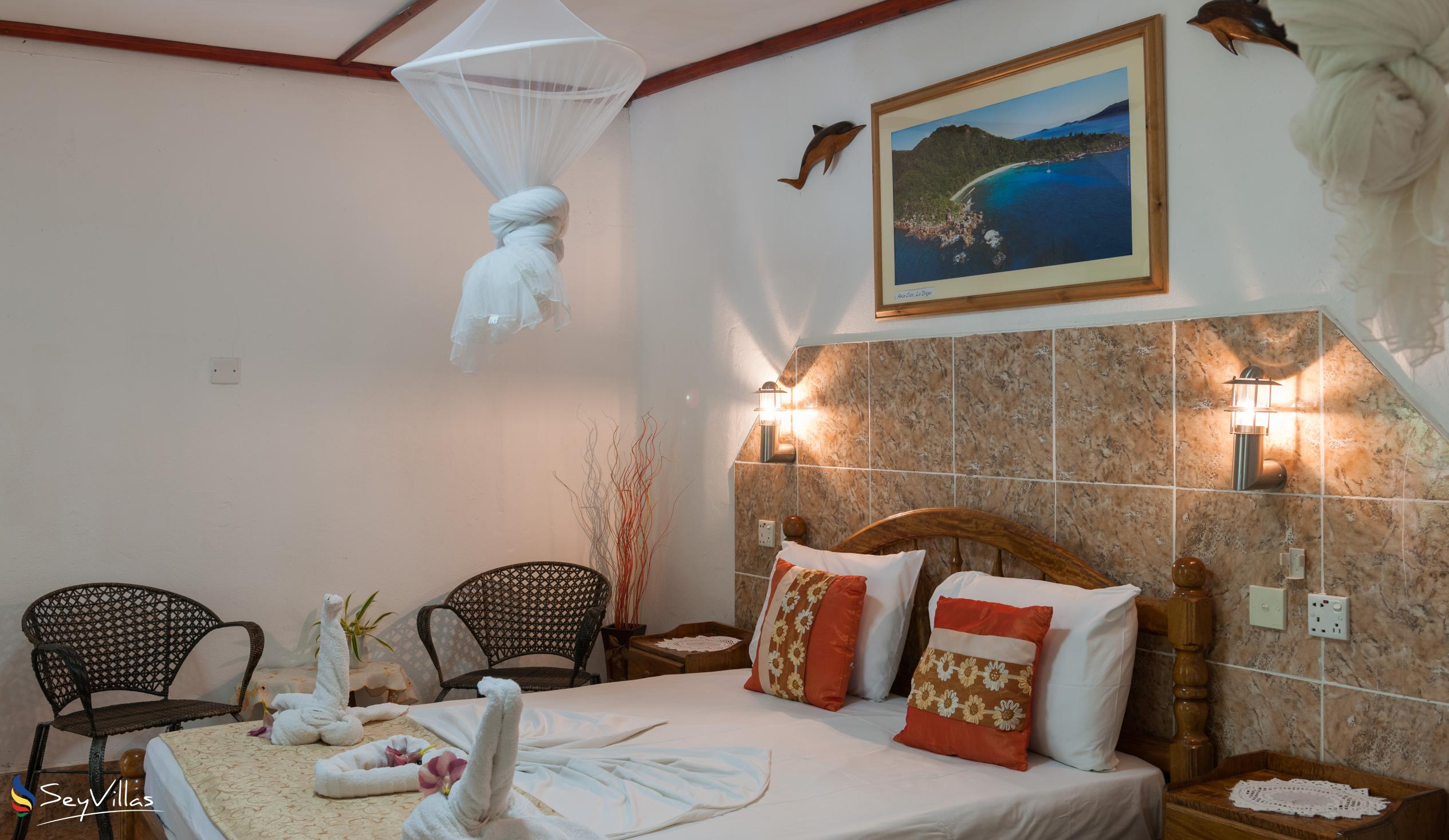 Foto 67: Rising Sun Guesthouse - Standard Dreibettzimmer - La Digue (Seychellen)