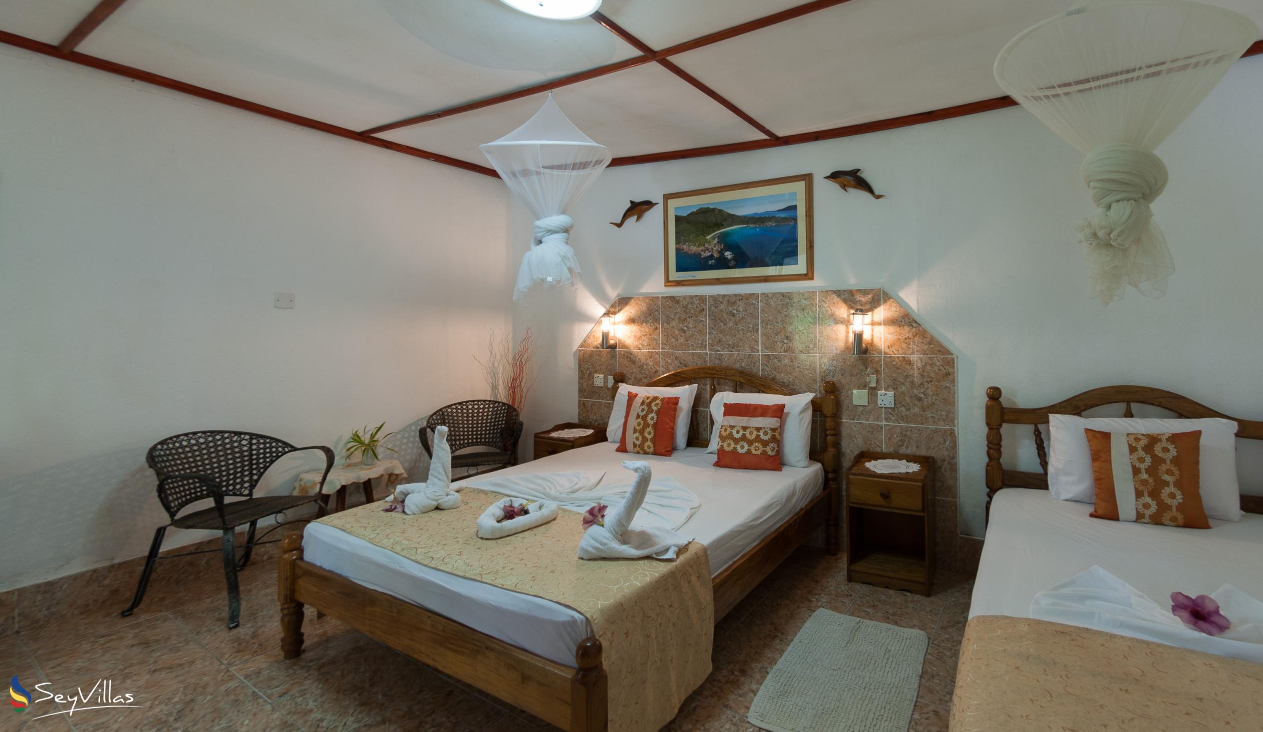 Foto 68: Rising Sun Guesthouse - Standard Dreibettzimmer - La Digue (Seychellen)
