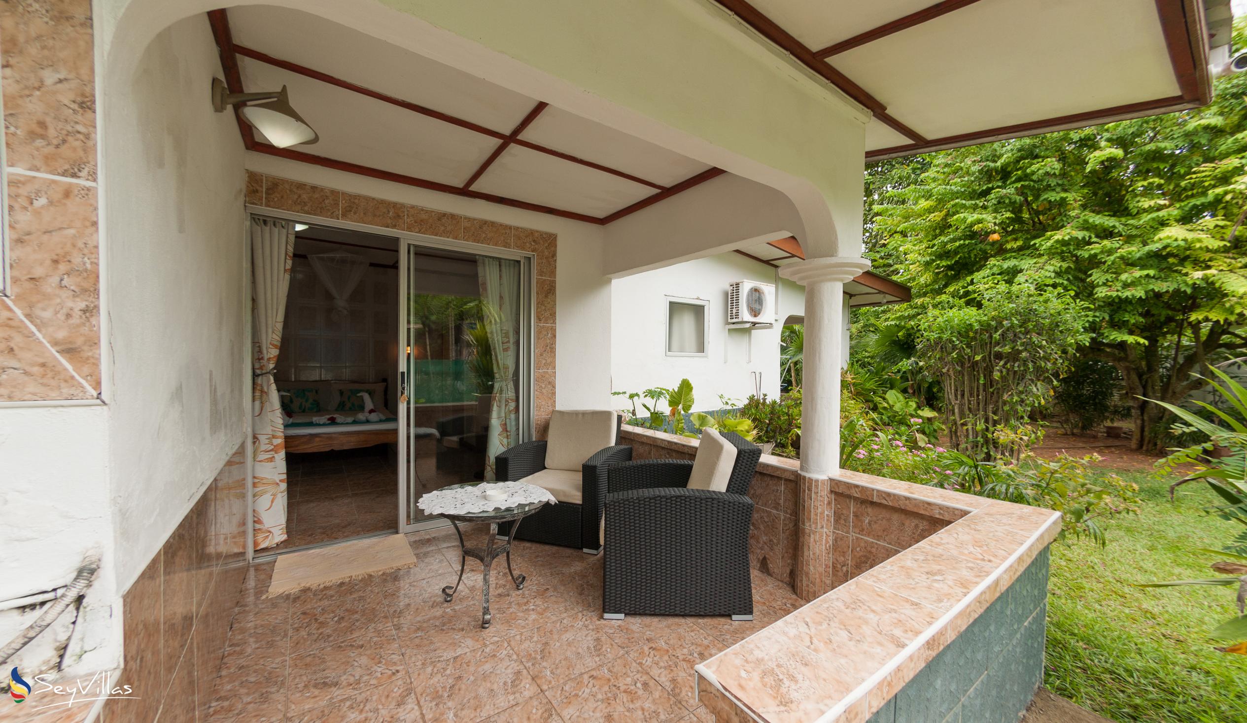 Foto 58: Rising Sun Guesthouse - Standard Dreibettzimmer - La Digue (Seychellen)