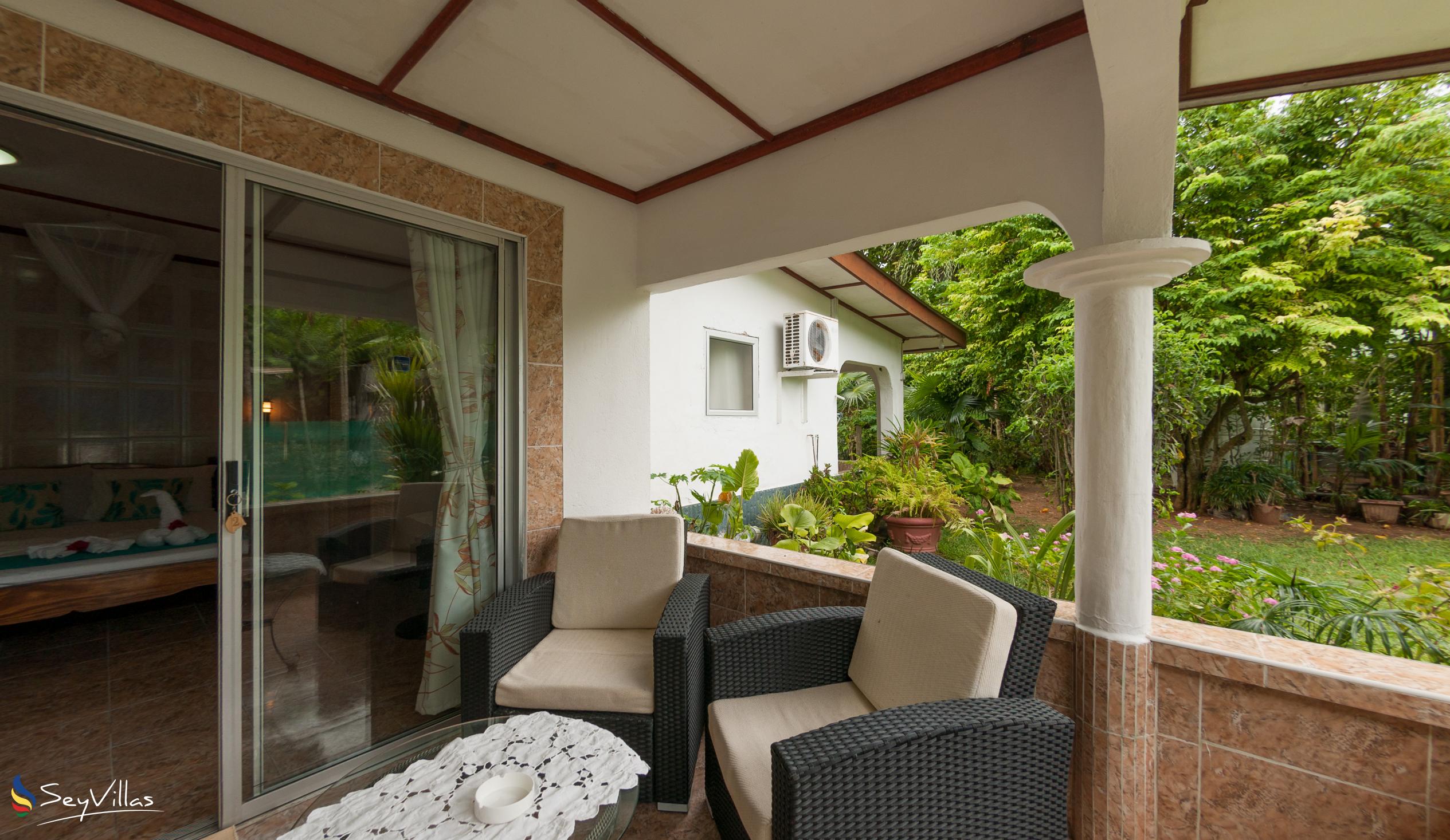Foto 57: Rising Sun Guesthouse - Standard Dreibettzimmer - La Digue (Seychellen)