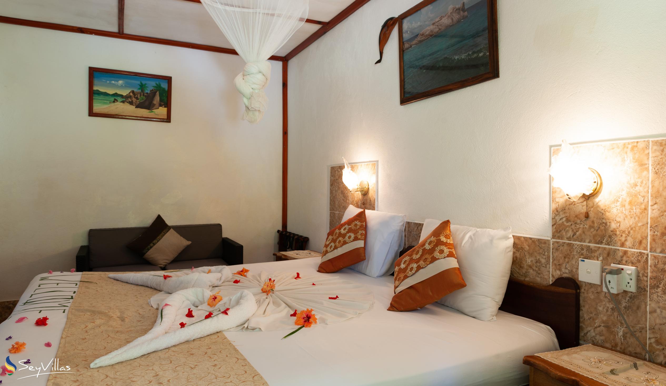 Foto 100: Rising Sun Guesthouse - Standard Zimmer - La Digue (Seychellen)