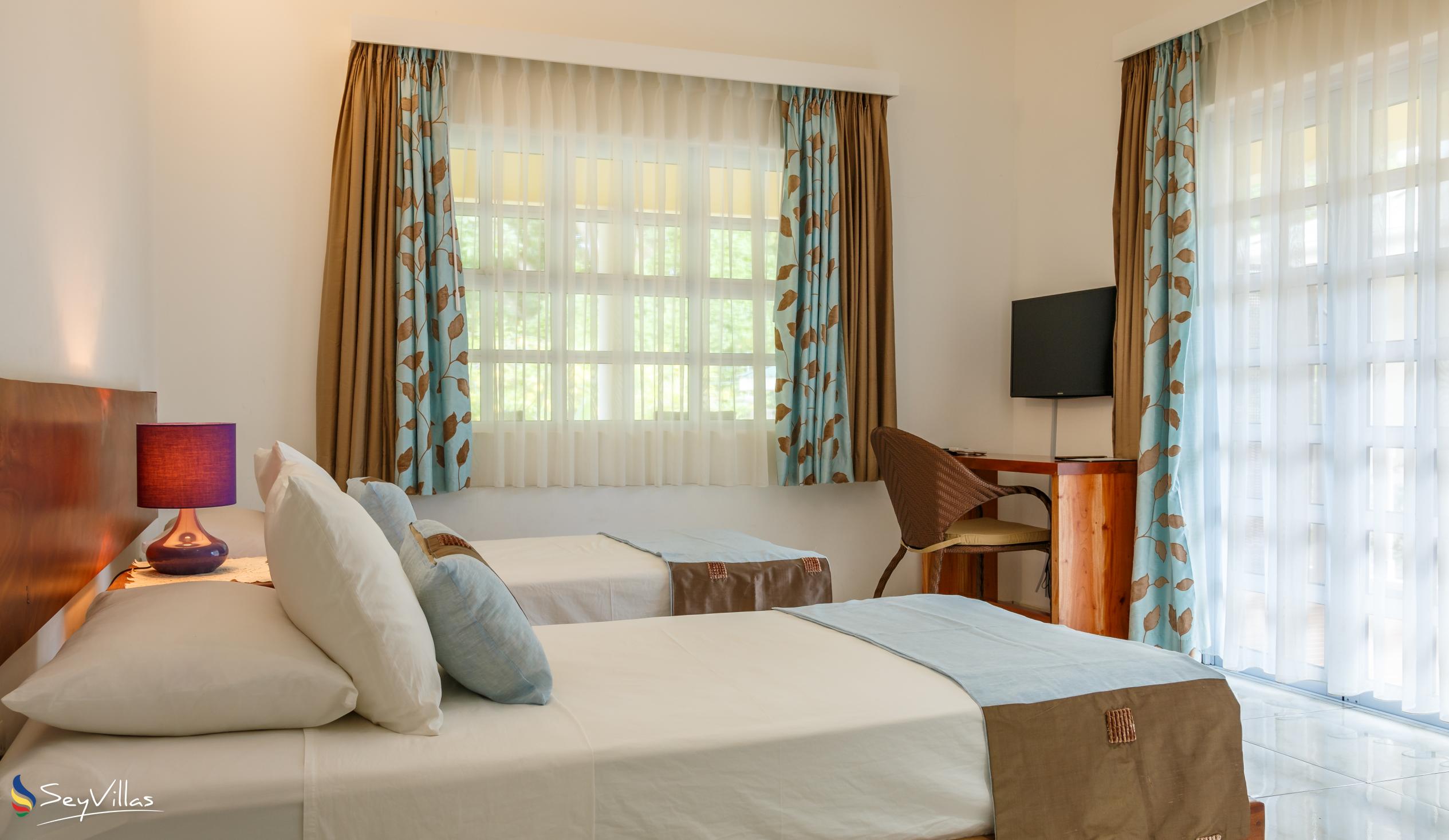 Foto 75: Captain's Villa - Chambre lits jumeaux avec terrasse - Mahé (Seychelles)