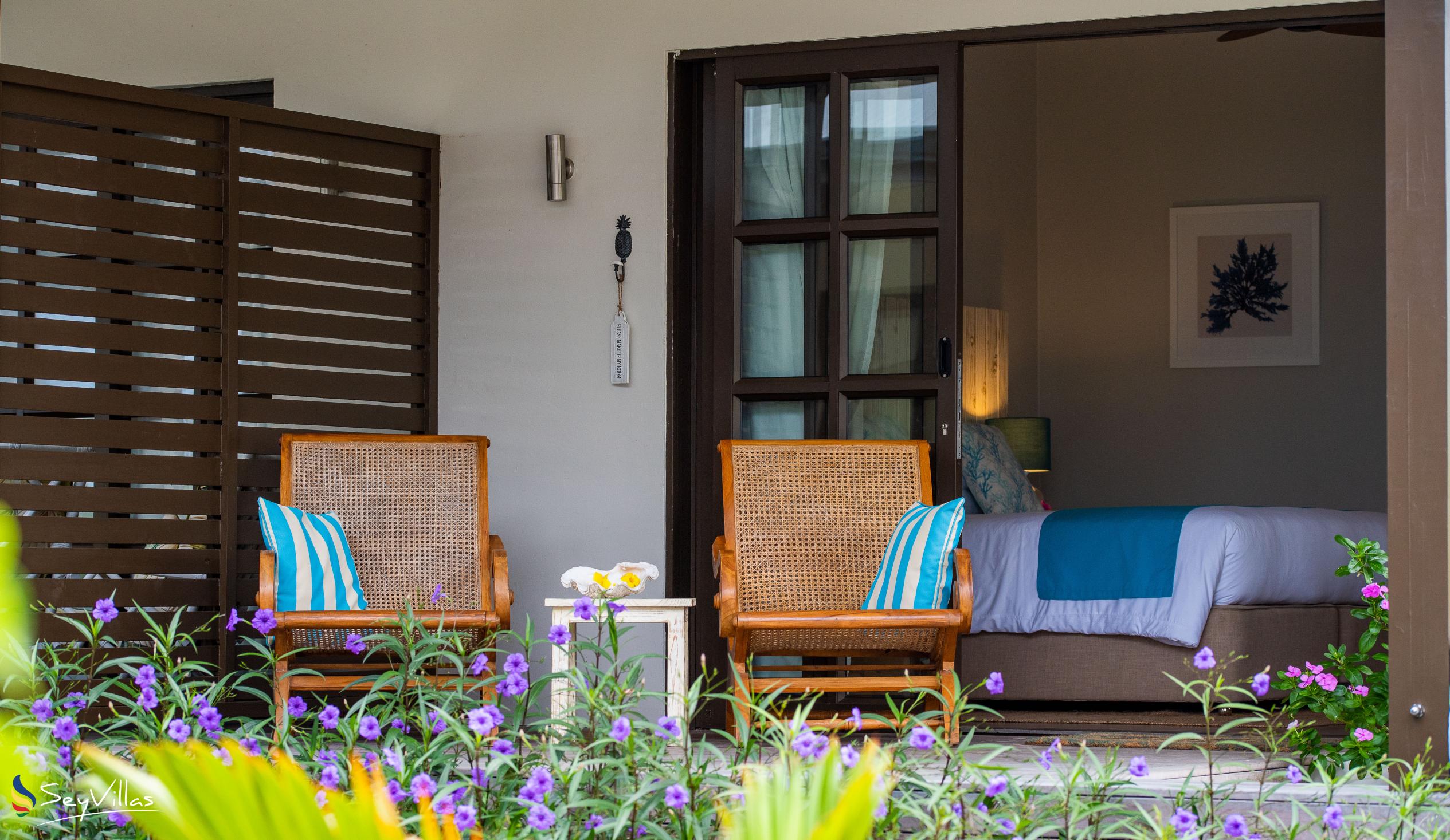 Foto 18: Le Nautique Luxury Waterfront Hotel - Gartenblickzimmer mit Kingsize-Bett - La Digue (Seychellen)