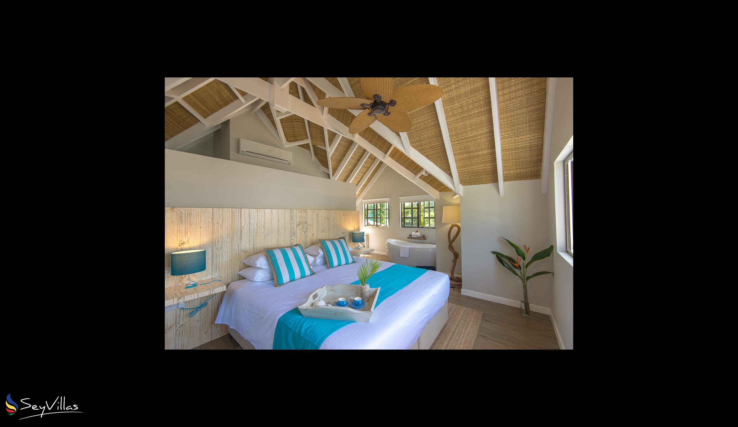 Foto 75: Le Nautique Luxury Waterfront Hotel - Deluxe-Meerblickzimmer mit Kingsize-Bett - La Digue (Seychellen)