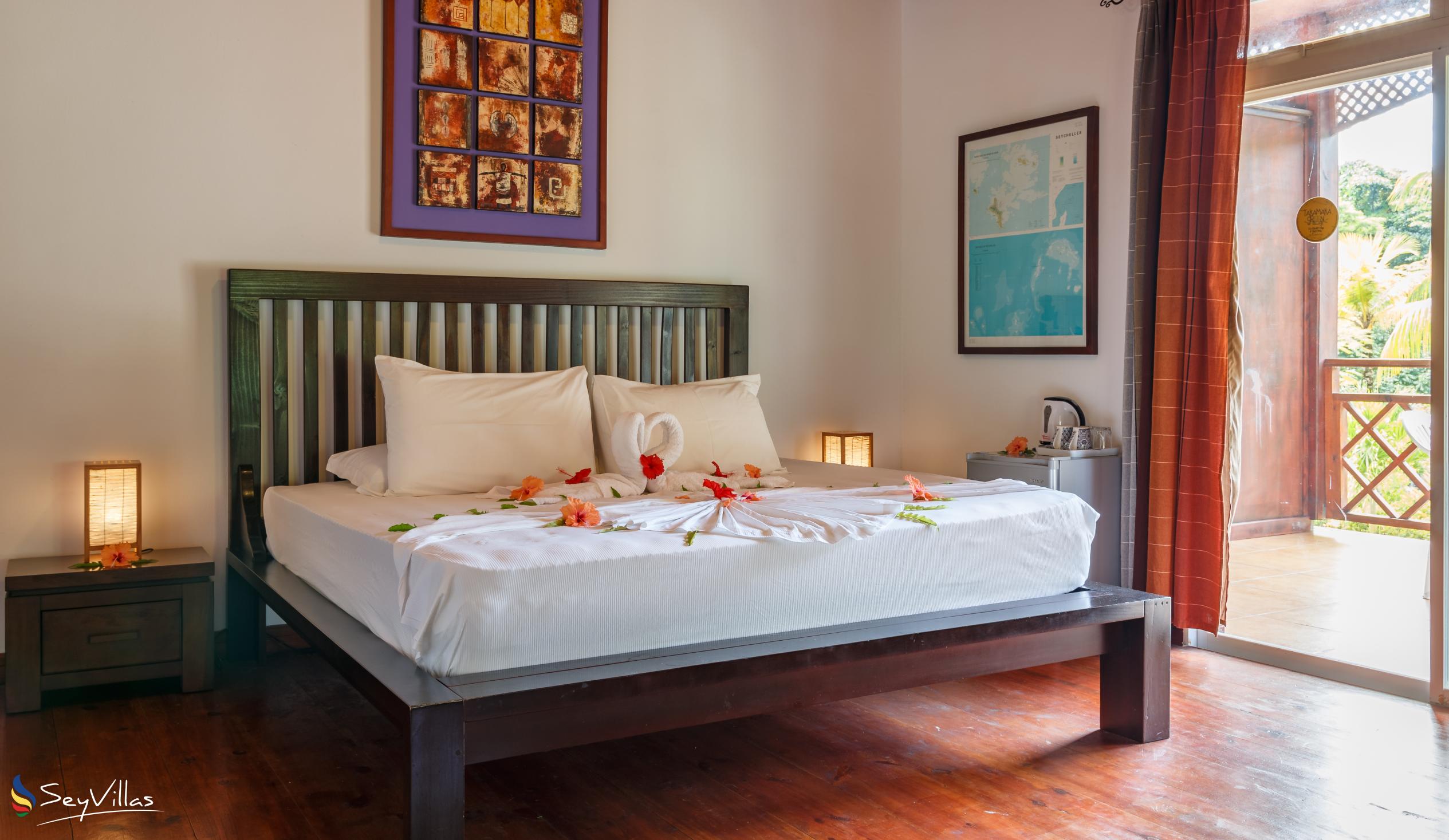 Foto 59: Takamaka Green Village - Chambre standard dotée d’un lit king-size - Mahé (Seychelles)