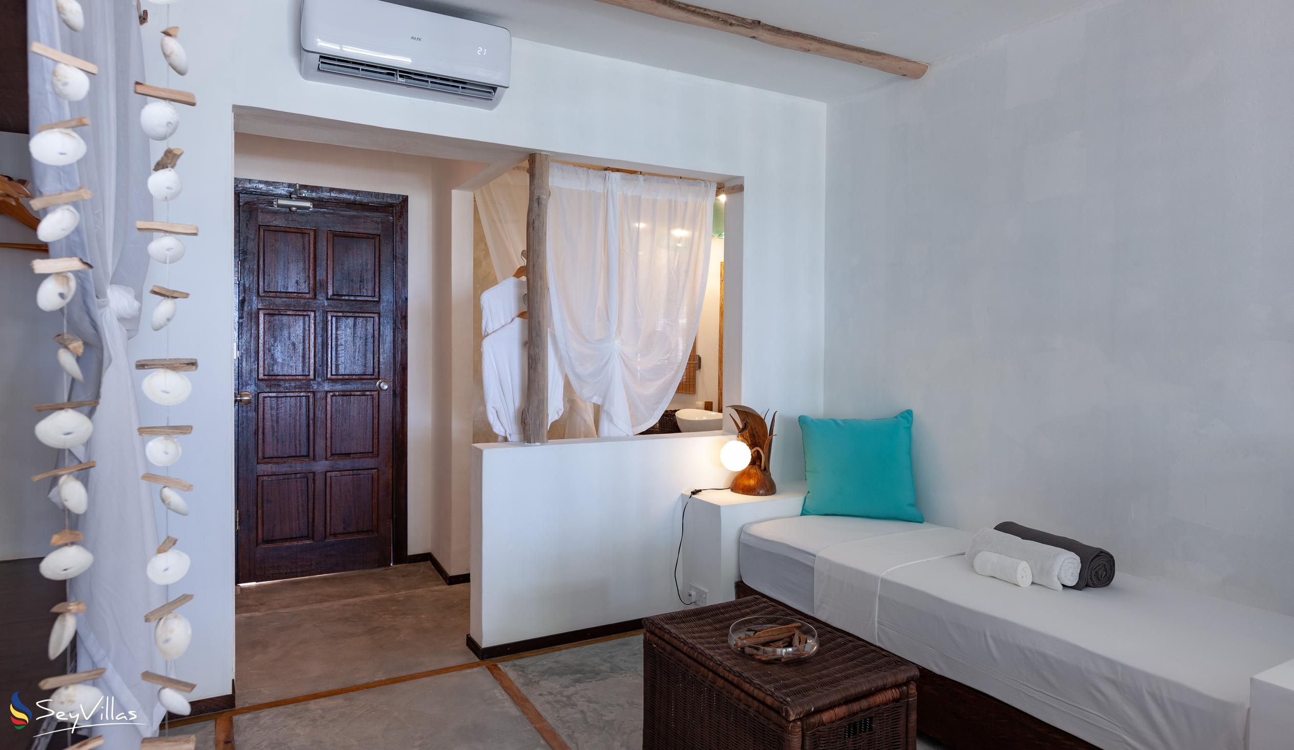 Foto 100: Bliss Hotel Praslin - Beach House - Beach Deluxe Zimmer - Praslin (Seychellen)