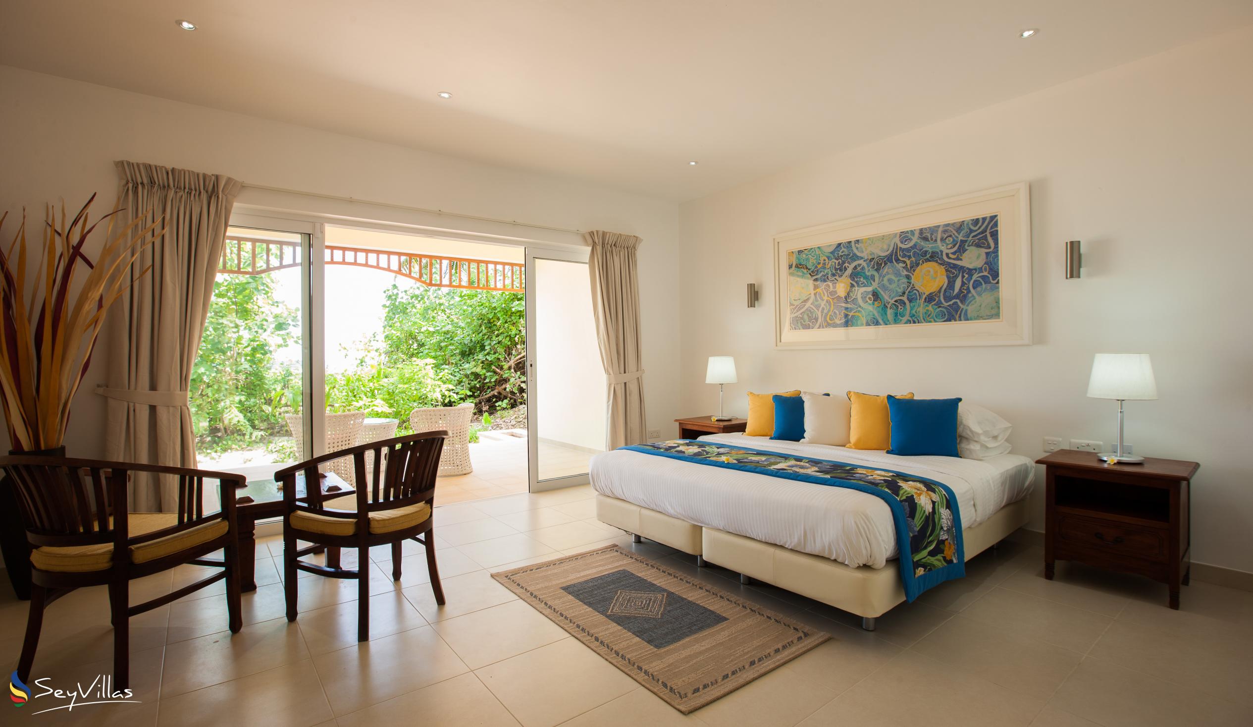 Foto 17: Acajou Beach Resort - Deluxe Zimmer - Praslin (Seychellen)