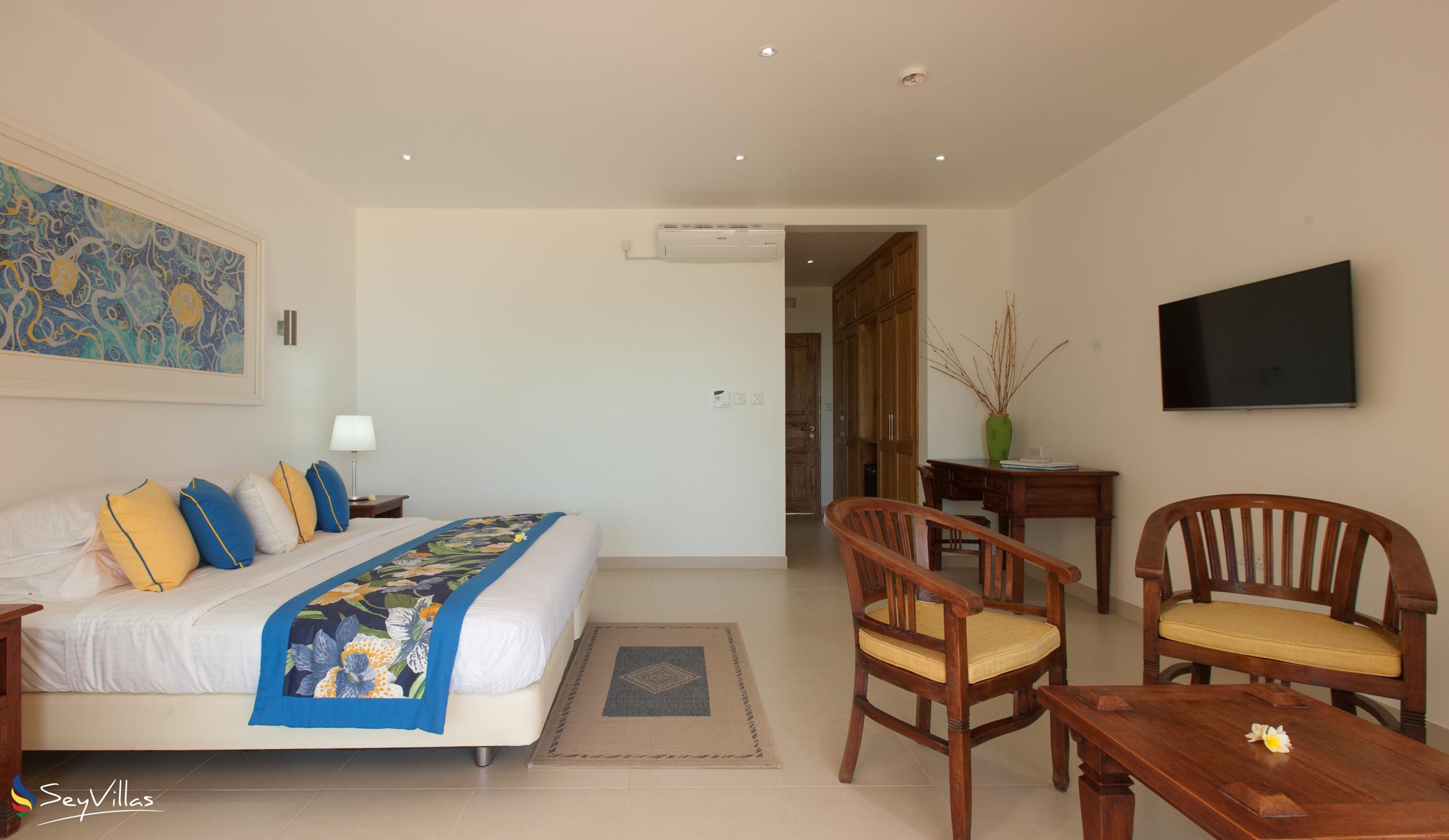 Foto 18: Acajou Beach Resort - Deluxe Zimmer - Praslin (Seychellen)