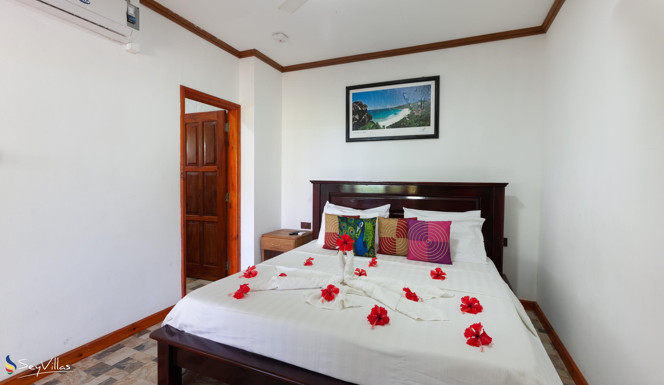 Foto 24: Bwaver Cottage - Doppelzimmer mit Gartenblick - La Digue (Seychellen)