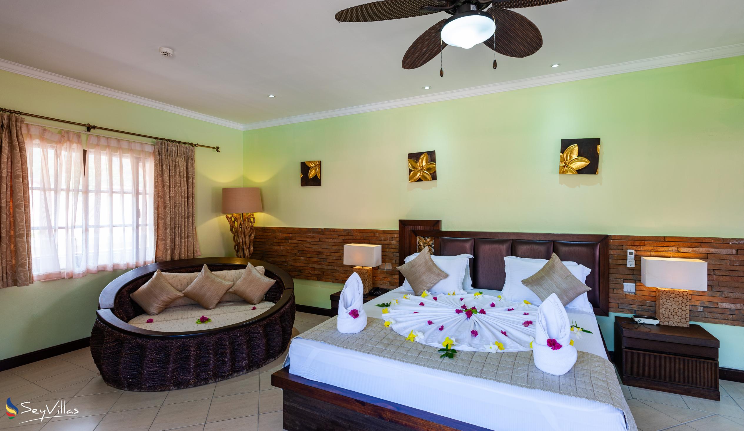 Foto 55: Oasis Hotel, Restaurant & Spa - Deluxe Zimmer - Praslin (Seychellen)
