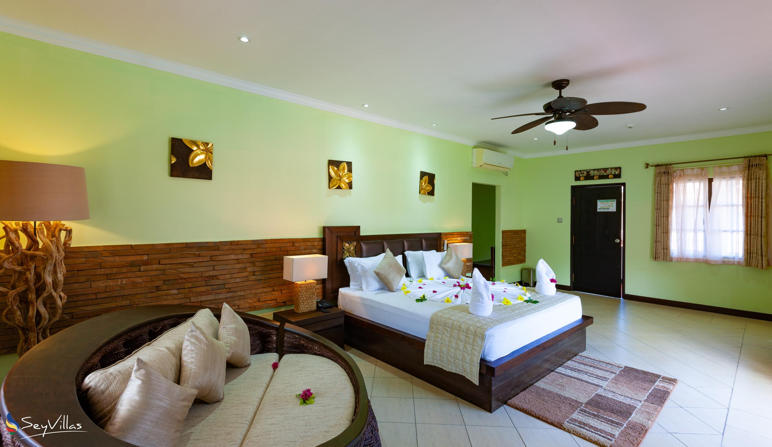 Foto 60: Oasis Hotel, Restaurant & Spa - Deluxe Zimmer - Praslin (Seychellen)
