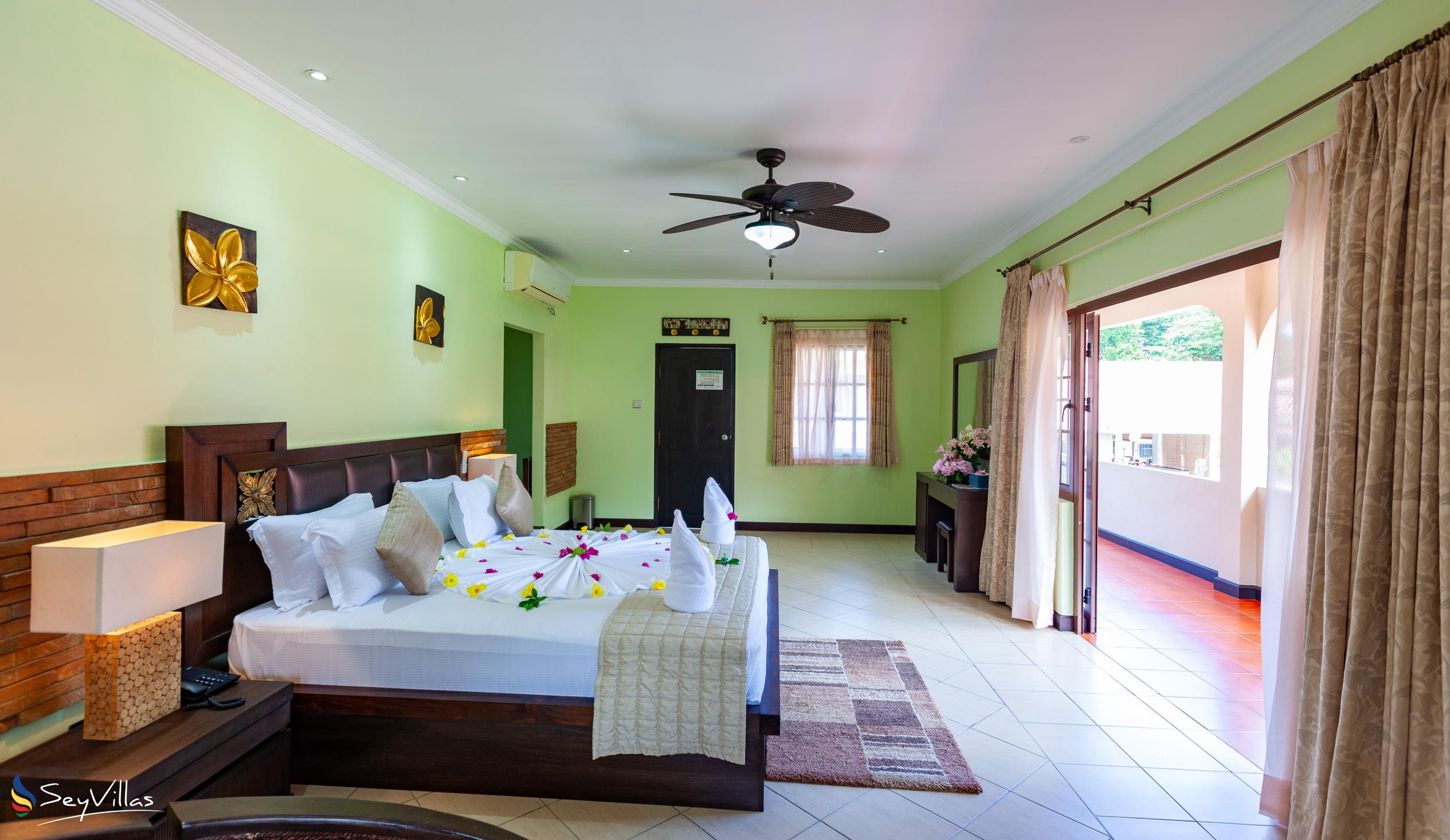 Foto 59: Oasis Hotel, Restaurant & Spa - Deluxe Zimmer - Praslin (Seychellen)